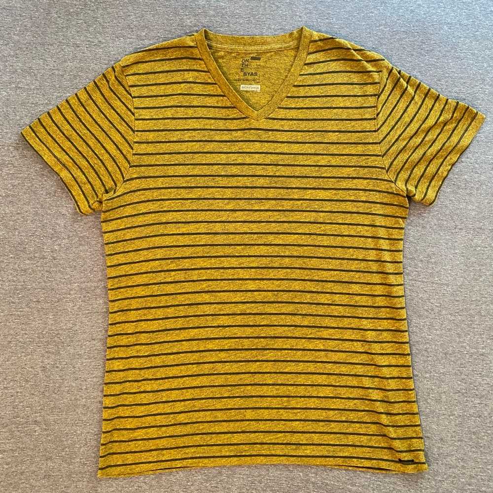 Short sleeved yellow v-neck with black stripes